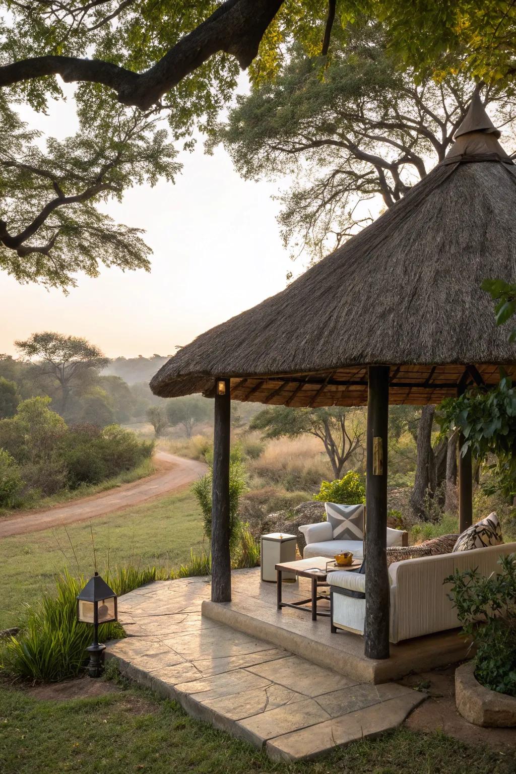 A thatched roof adds rustic charm to a cozy patio.