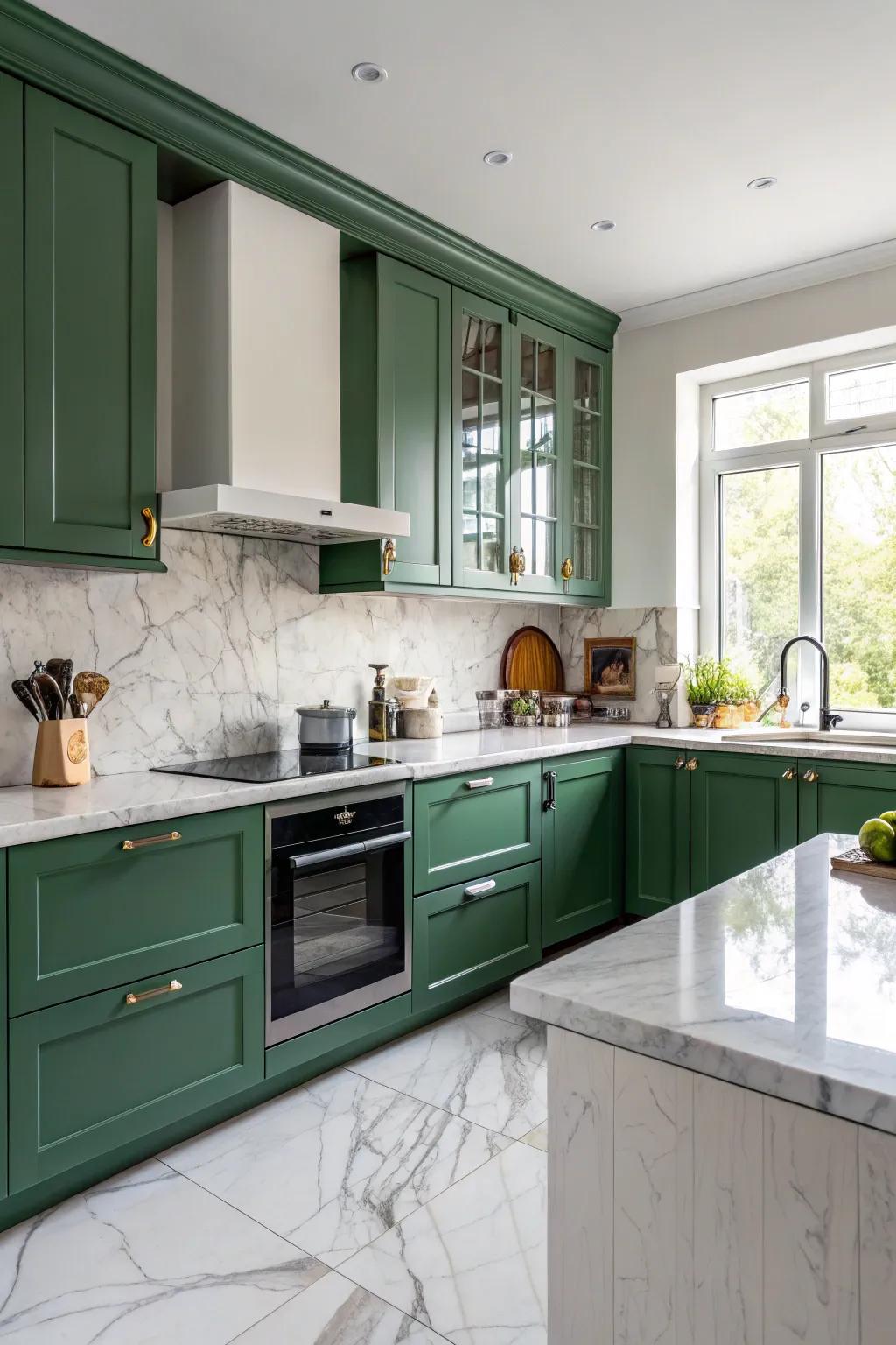 Elegant marble countertops enhancing a green kitchen design.