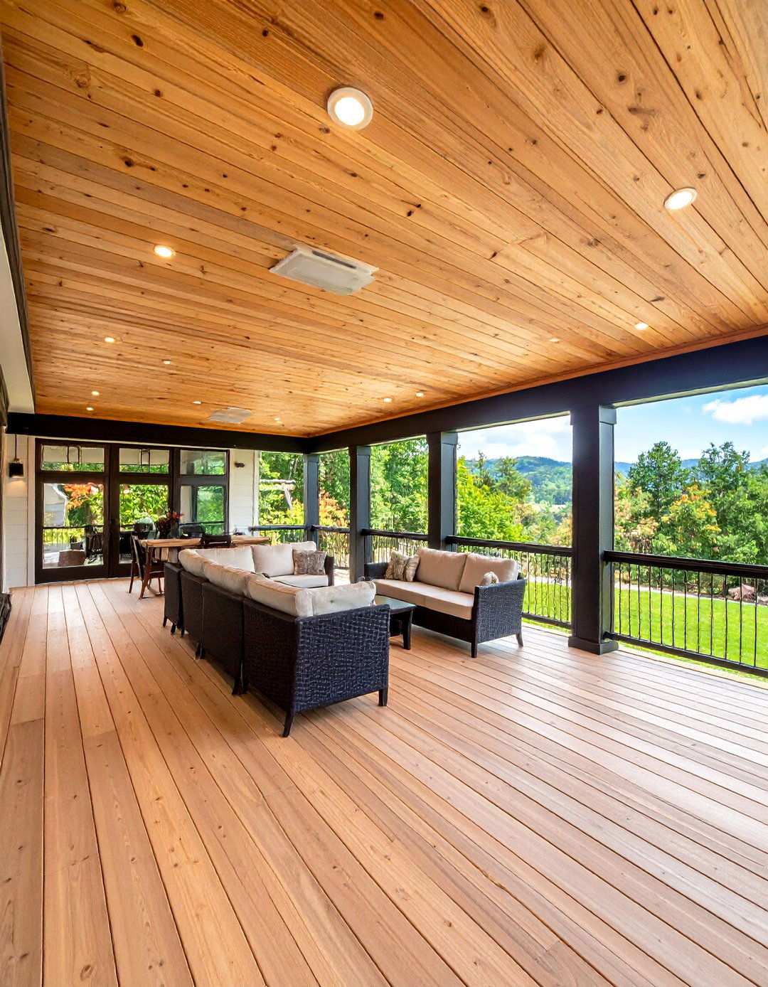 Cedar Under Deck Ceiling Warms a Two Story Black Home - 20 Black House With Cedar Accents
