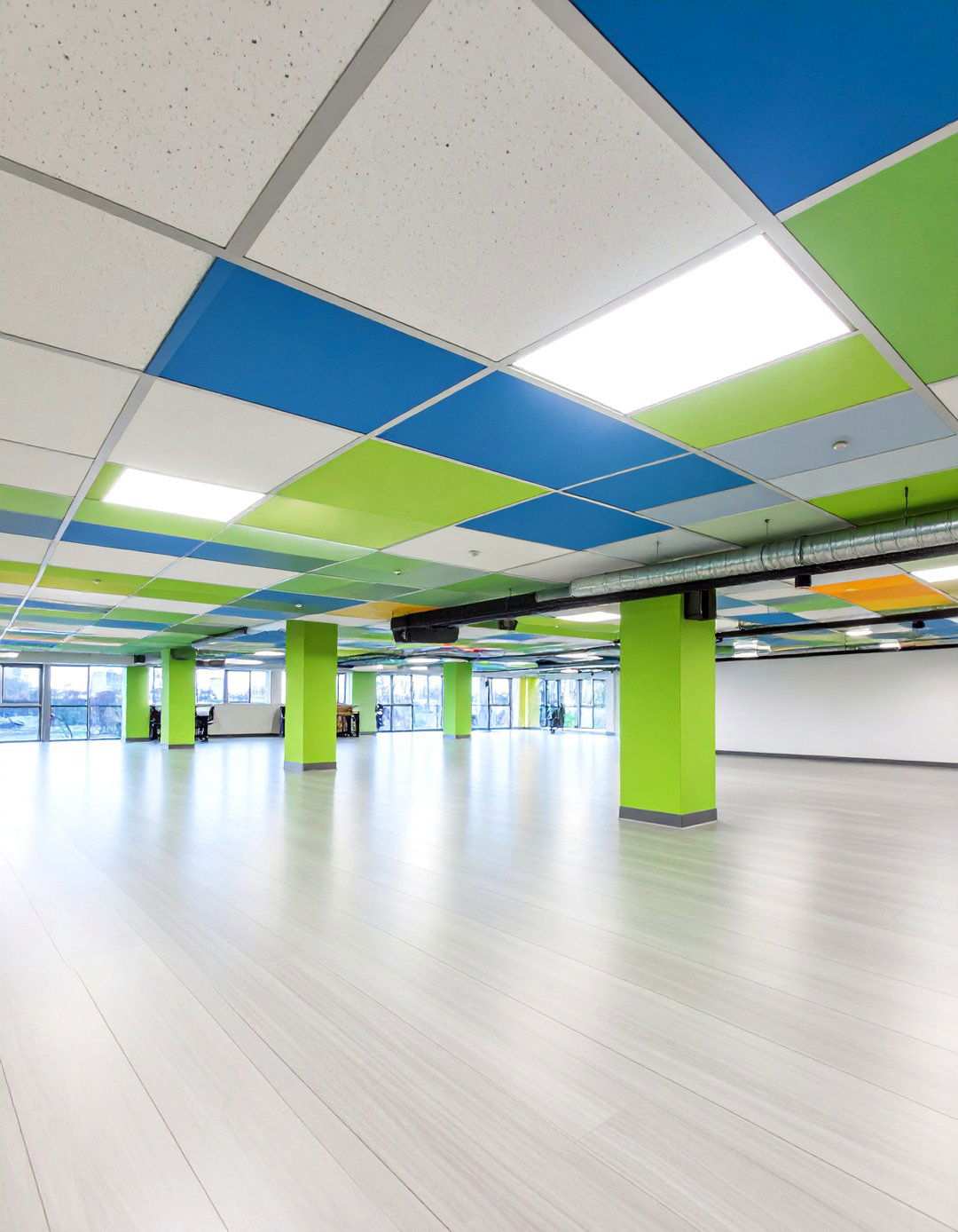 Mixed Size Grid Creates Subtle Rhythm - 20 Basement Drop Ceiling Ideas